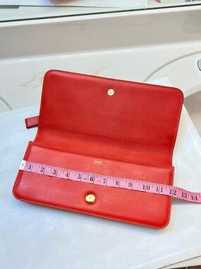 TOM FORD Orange leather Clutch excellent condition 12 inches by 6 clean interior